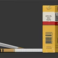 Parisienne Brand Cigarettes With Yellow Box And Filter Tips On Black Surface