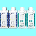 Four Bottled Milk Drinks With Pure And High Calcium Options In Blue Green Packaging