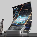 Man Observing High Tech Sand Table With Curved Display Urban Map And Building Models