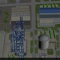 Industrial Plant With Blue Towers White Storage Tanks Green Trees And Surrounding Roads