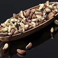 Roasted Brazil Nuts in Wooden Bowl on Black Background with Reflections