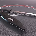 Two Tactical Knives Displayed On Textured Mat