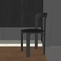 Modern Single Chair Interior Design With Sleek Metal Frame And Black Seat
