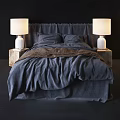 Double Bed with Dark Blue Linen Sheets Brown Blanket and Wooden Nightstands White Lamps