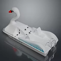 White Swan Shaped Pedal Boat With Red Beak Seats Pedals And Blue Accents