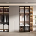 Modern Wardrobe Interior With Glass Doors Hanging Clothes Folded Garments And Shelves