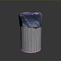 Silver Perforated Metal Trash Can With Blue Trash Bag Liner
