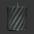 Green Twisted Pattern Candle With White Wick On Dark Background Reflection Surface
