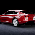 Red Sports Car With Modern Sleek Design Streamlined Body And Silver Alloy Wheels