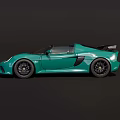 Green Convertible Sports Car With Sleek Body Design And Black Alloy Wheels
