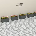 Outdoor Garden Decor with Modern Hexagonal Flower Planters and Colorful Flowers in Paved Setting