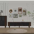 Vintage Wooden TV Stand With Decorative Wall Frames Potted Plant And Round Rug