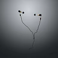 Wired In Ear Computer Headphones With Yellow Details On Black Background