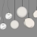 Multiple Modern Hanging Lit Chandeliers Round Transparent White Shapes Minimalist Interior