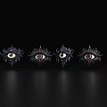 Ornate Decorative Eye Sculptures Arranged In A Row With Intricate Details On Black Background