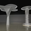 Modern Sculptural Columns With Flowing And Stacked Designs In Illuminated Interior Space 3d model