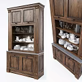 Wooden Sideboard with Open Shelves and Cabinet Doors Holding White Dinnerware and Glassware