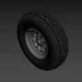 Off Road Vehicle Tire With Deep Tread Pattern And Silver Alloy Rim
