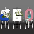 Three White Commercial Display Easels With Decorative Floral Setups And Mirror Accents