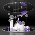 Purple And Silver Decorative Balls With Hanging Bottles On Round Display Stand