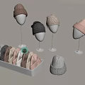Knitted Hats Display Featuring White Mannequin Heads And White Box With Various Colors