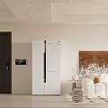Modern Living Dining Room Interior With White Sofa Refrigerator And Decorative Wall Art