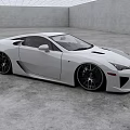 Stunning White Sports Car With Aerodynamic Body And Large Black Alloy Wheels
