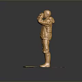 Golden Human Figure Statue With Shiny Surface On Round Base