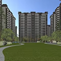 High Rise Residential Building Complex With Lush Green Lawn And Trees