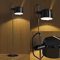Modern Black Floor Lamp With Cylindrical Shade And Warm Light For Living Room Interior