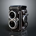 Vintage PHOTOREX Twin Lens Camera Electronic Device Featuring Black Silver Design and Knobs