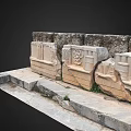Ancient Stone Carved Architectural Elements With Intricate Floral And Geometric Motifs