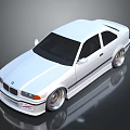 White BMW Two Door Coupe With Sporty Wheels And Sleek Body Design