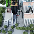 Industrial Factory Building With Tall Chimneys Pipes And Surrounding Green Areas