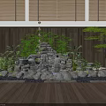 Rockery Stones Featuring Waterfall And Lush Plants On Wooden Deck With Bamboo Blinds Backdrop