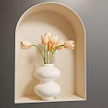 White Bulbous Vase With Orange And White Tulips In Arched Niche On Gray Beige Wall