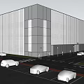 Modern Industrial Factory Building Exterior View with Parking Lot and Parked Vehicles