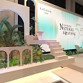 Stylish Event Stage With Large Screen And Greenery