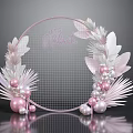 Pink Circular Celebration Decor With Leaf Accents Pearl Beads And Festive Design