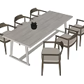 White Dining Table Set With Six Dark Frame Light Upholstered Chairs And Black Plant 3d model