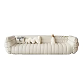 Plush Cream Leather Sectional Sofa With Stitched Design And Decorative Cushions