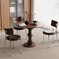 Modern Dining Area With Round Wooden Table Three Chairs Window Blinds And Potted Plant