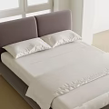 Modern Double Bed with Dark Brown Headboard White Sheets and Wooden Floor Near Windows