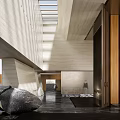 Elegant Contemporary Sales Office Lobby Featuring Natural Stone Decorations And Soft Daylight From Skylights