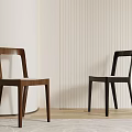 Modern Leisure Chairs in Brown and Black with Light Striped Wall and Wooden Floor