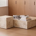 Modern Beige Stone Coffee Table With Block Design Stacked Books And Wooden Cabinets