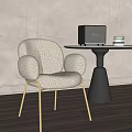 Beige Fleece Dining Chair With Golden Legs And Black Round Table