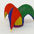 Colorful Jester Hat With Red Green Blue Yellow Sections And Gold Pom Poms