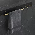 Modern Black Bathroom Shelf With Gold Hooks And Gray Towel On Marble Wall