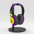 Patterned Over Ear Headphones With Black Purple Yellow Colors On Black Stand